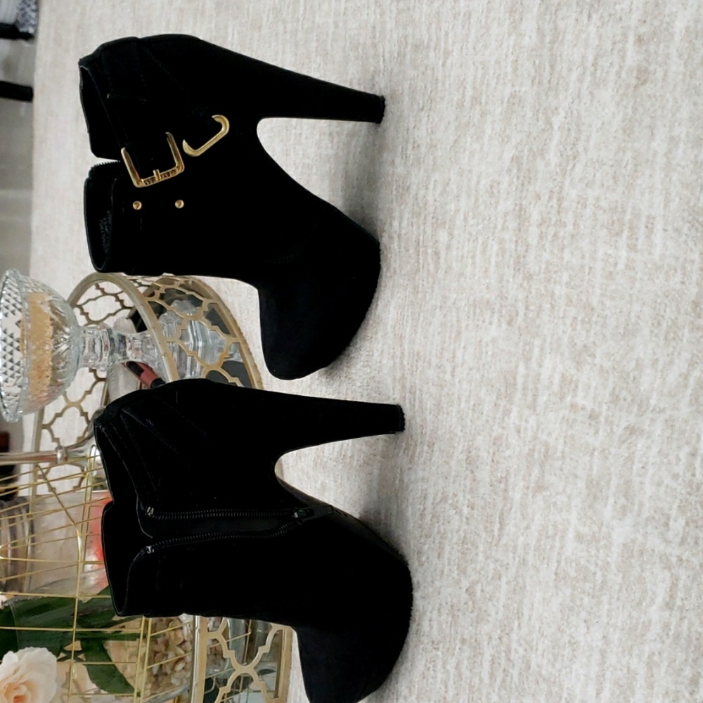Black ankle boots by Guess, size 6.5